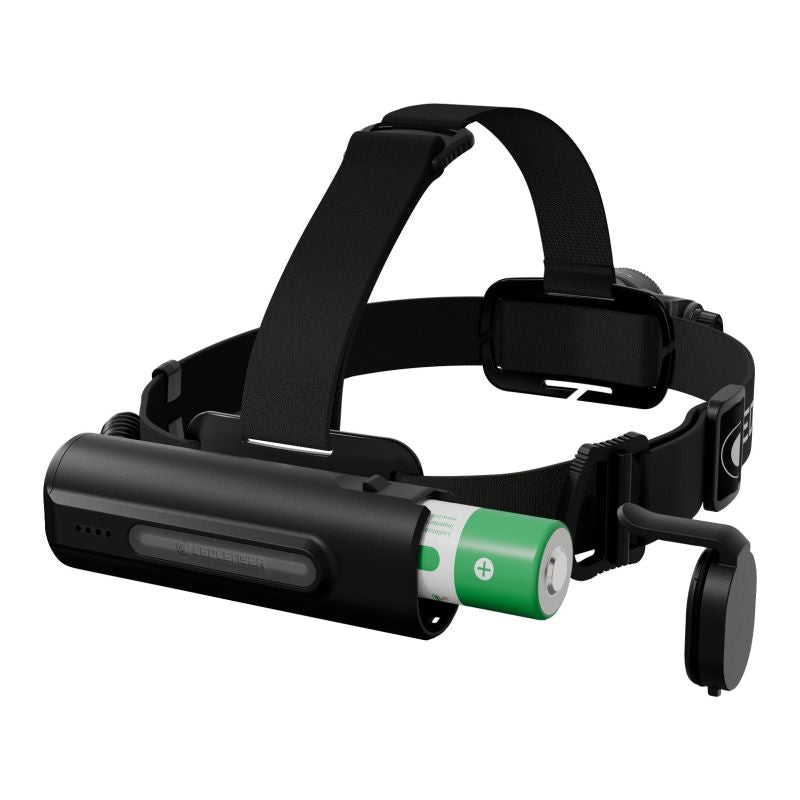 A black headlamp with an adjustable strap and a cylindrical battery inserted into the front housing, shown on a plain white background.