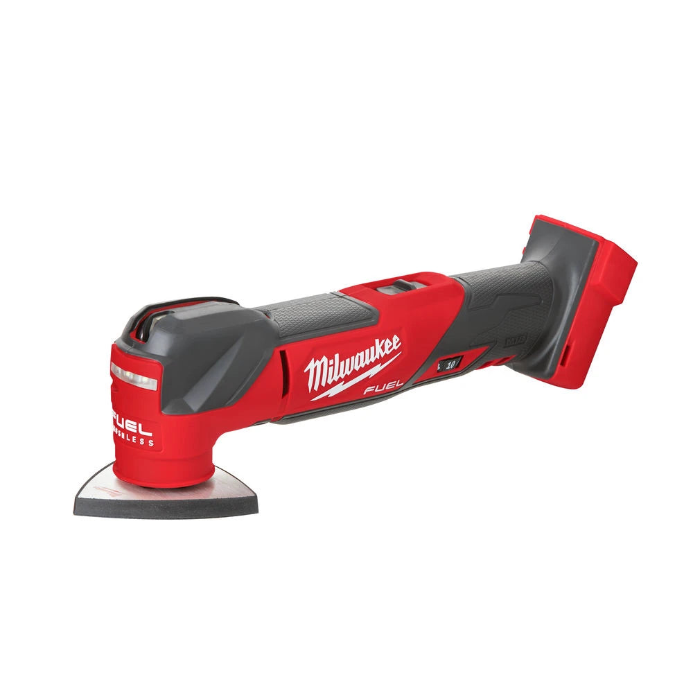 Milwaukee Fuel cordless multi-tool with a red and dark gray body, featuring the Milwaukee logo on the side, shown on a plain white background.