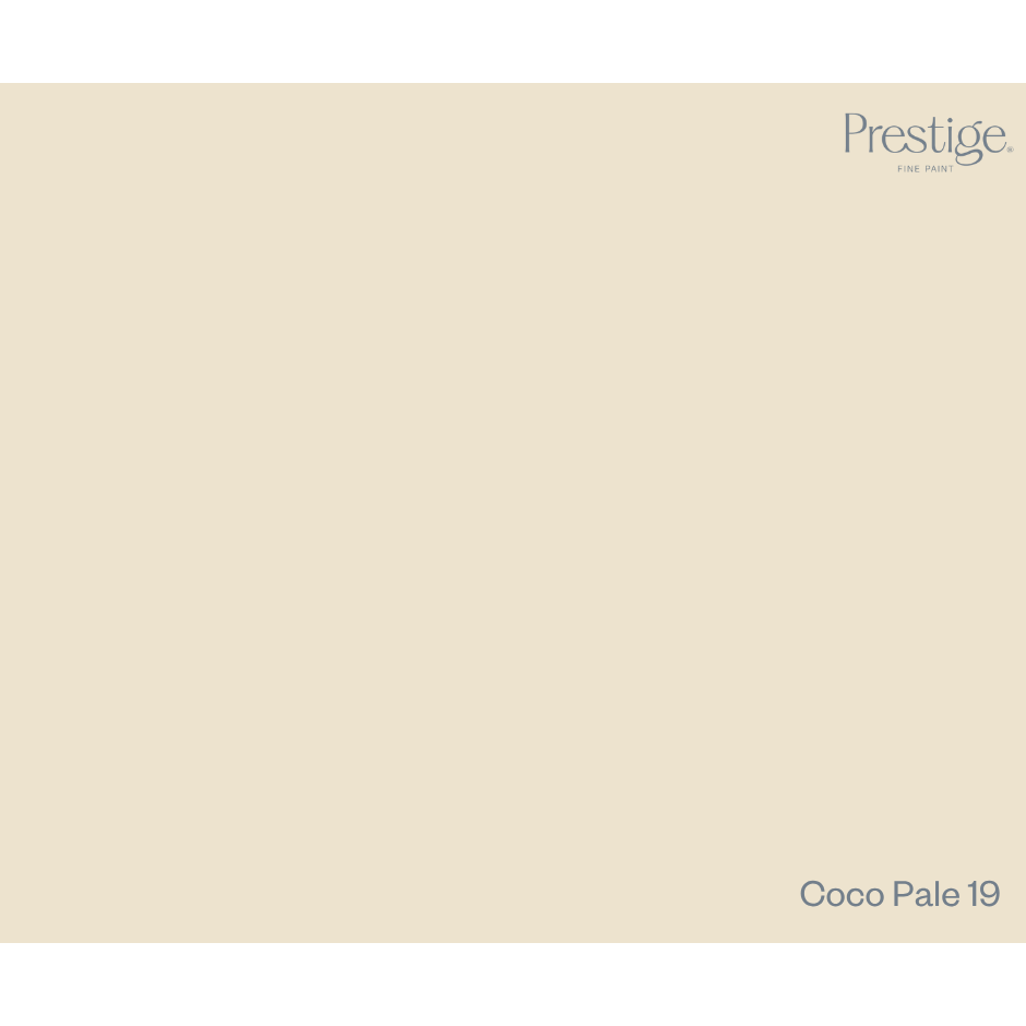 A solid color swatch card for Prestige Fine Paint in 'Coco Pale 19', showing a warm cream-beige color with the brand and product name printed in the corners.