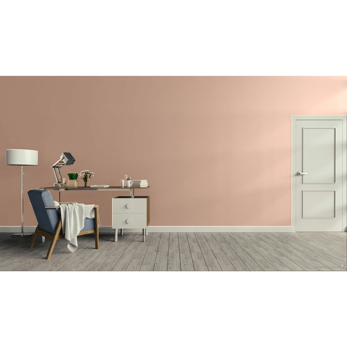 A minimalist room scene with a dusty pink wall, grey wood floor, a white door on the right, and a home office setup on the left featuring a blue armchair, desk, lamp, and side table.
Prestige Dahila Paint
