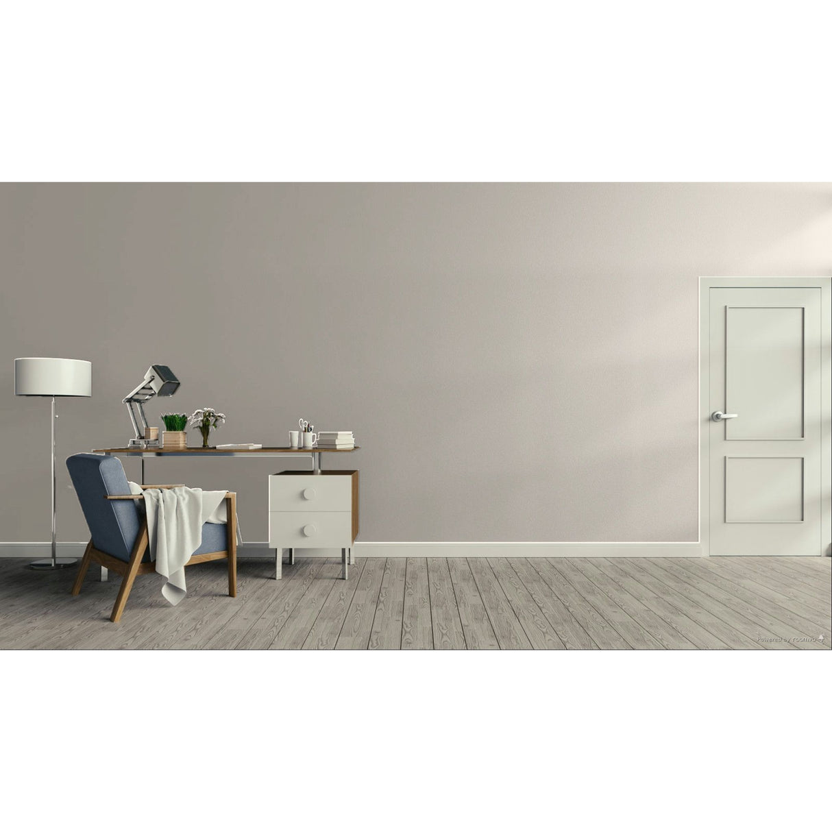 A minimalist room scene with a gray wall, light wood floor, a blue upholstered armchair with a draped throw, a small desk with a lamp and books, and a white door on the right.