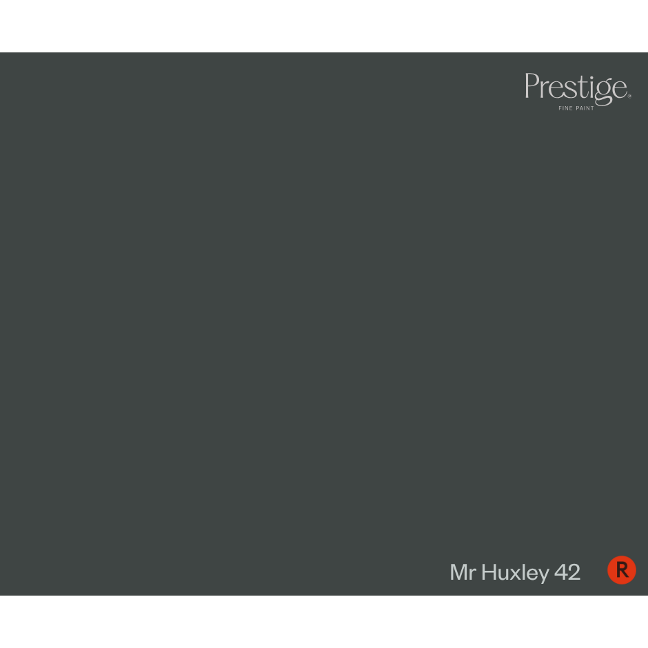 A solid dark charcoal gray color swatch with the Prestige brand logo in the top right corner and the text 'Mr Huxley 42' with a red 'R' circle in the bottom right corner.