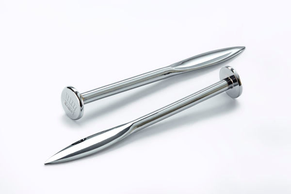 Two long metallic nails with twisted shanks and flat round heads, photographed on a clean white background.