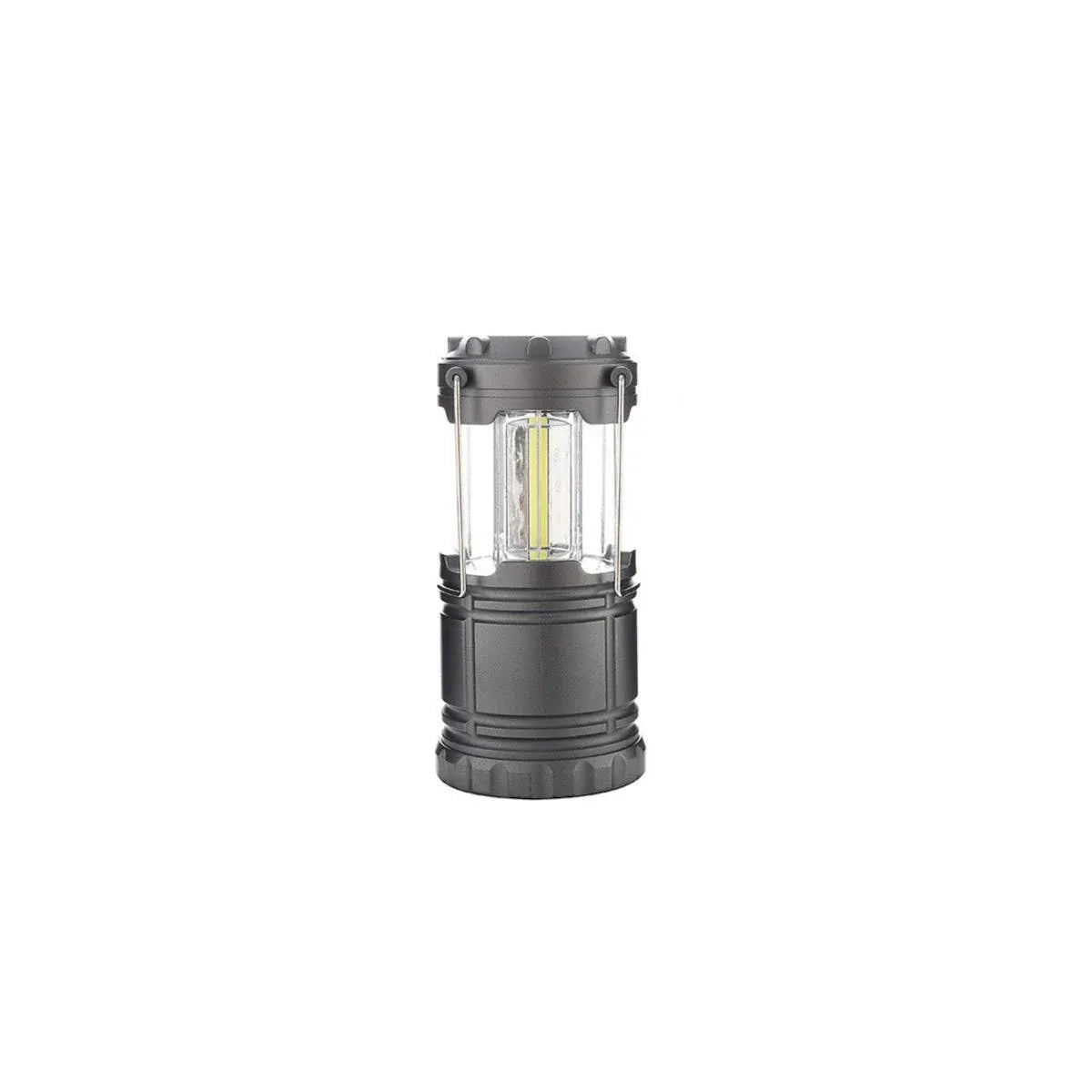 A dark gray tactical camping lantern with a clear plastic window showing a yellow LED light inside, set against a plain white background.
