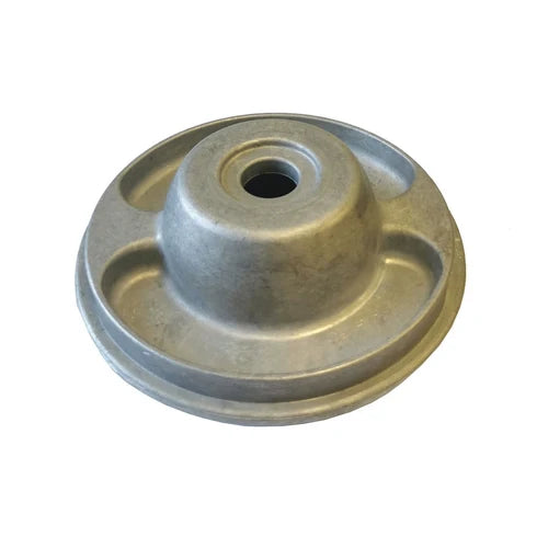A metallic circular mechanical part with a central hole and three recessed sections, shown on a plain white background. Ama Scorpion Strimmer Head – Universal Fitting | Alloy
