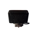 A black ribbed rectangular light fixture or LED module with a metal mounting bracket and attached cable, shown against a plain white background.
247 Lighting LED Rectangular Work Lamp | 6 Inch | 18W | 12-24V