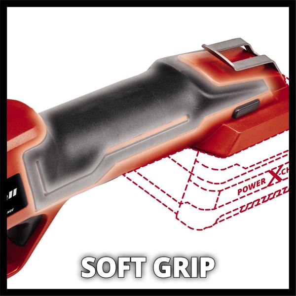 An electric tool with a red and black body, shown on a white background with a dashed red graphic illustrating grip shape and the text 'SOFT GRIP' and 'POWER X-Cell'.