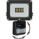 Black outdoor floodlight with integrated motion sensor and mounting bracket, shown on a white background with gray rotation arrows indicating adjustable head tilt.