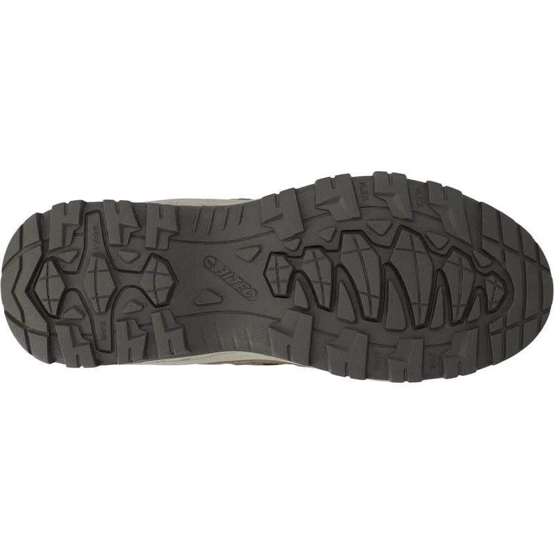 Top-down view of a hiking shoe's rugged treaded outsole, showing the Vibram logo embossed in the center, on a plain white background. Hi-Tec Bandera Expedition Leather Women's Hiking Boots | Olive 3