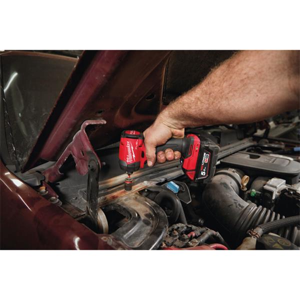Person using a red and black cordless drill in a car engine bay
Milwaukee M18FID3-0 M18 Fuel Gen 4 Impact Driver | Bare Unit