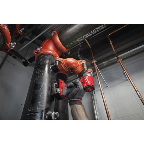 Person using a red power tool on pipes in an industrial setting
Milwaukee M18FID3-0 M18 Fuel Gen 4 Impact Driver | Bare Unit