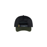 A black trucker-style cap viewed from the back, featuring a black mesh back, a dark olive green curved brim, and a black plastic snap closure with a small yellow, red, and green tag.