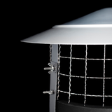 Close-up of a metal outdoor light fixture or vent cover with a wide white top section, silver wire mesh grid, and mounting hardware against a black background.