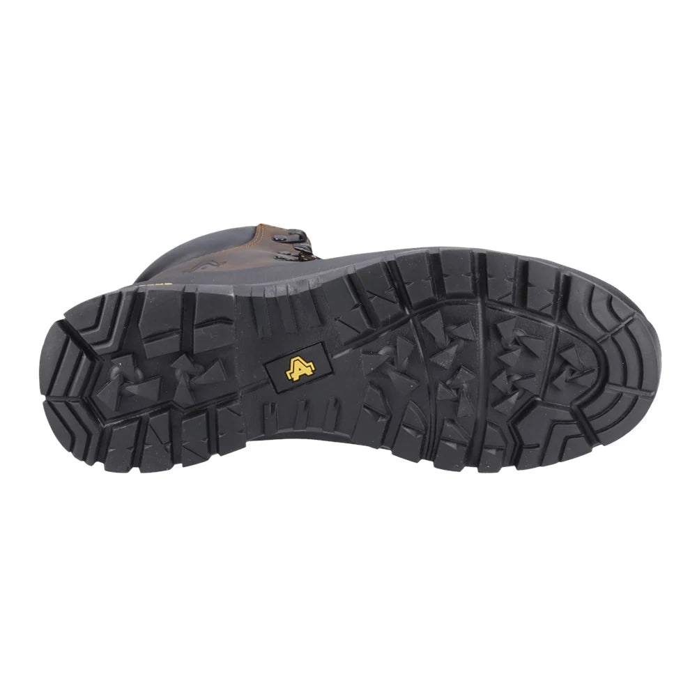 Close-up of a black boot sole with a brand logo on a white background