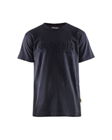 A dark navy blue short-sleeve crewneck t-shirt with 'BLÅLÄDER' printed in a tonal, raised font across the chest, shown against a plain white background.