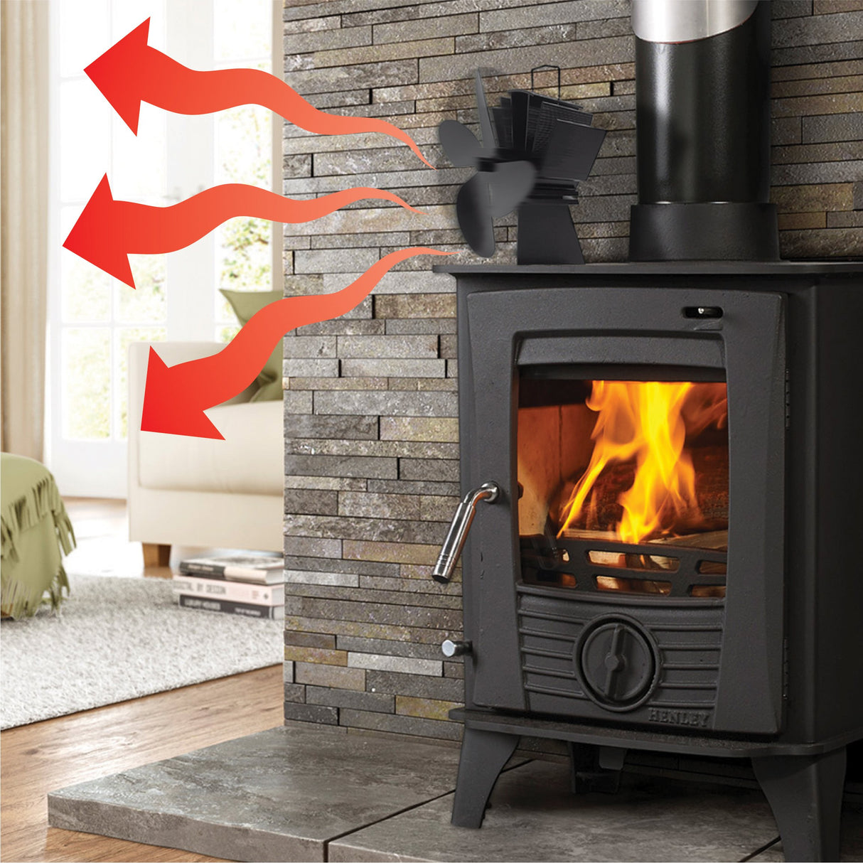 A black wood-burning stove with a visible fire, set against a stone-tile wall in a home interior. Red arrows point from the stove toward a fan, suggesting airflow or heat direction.