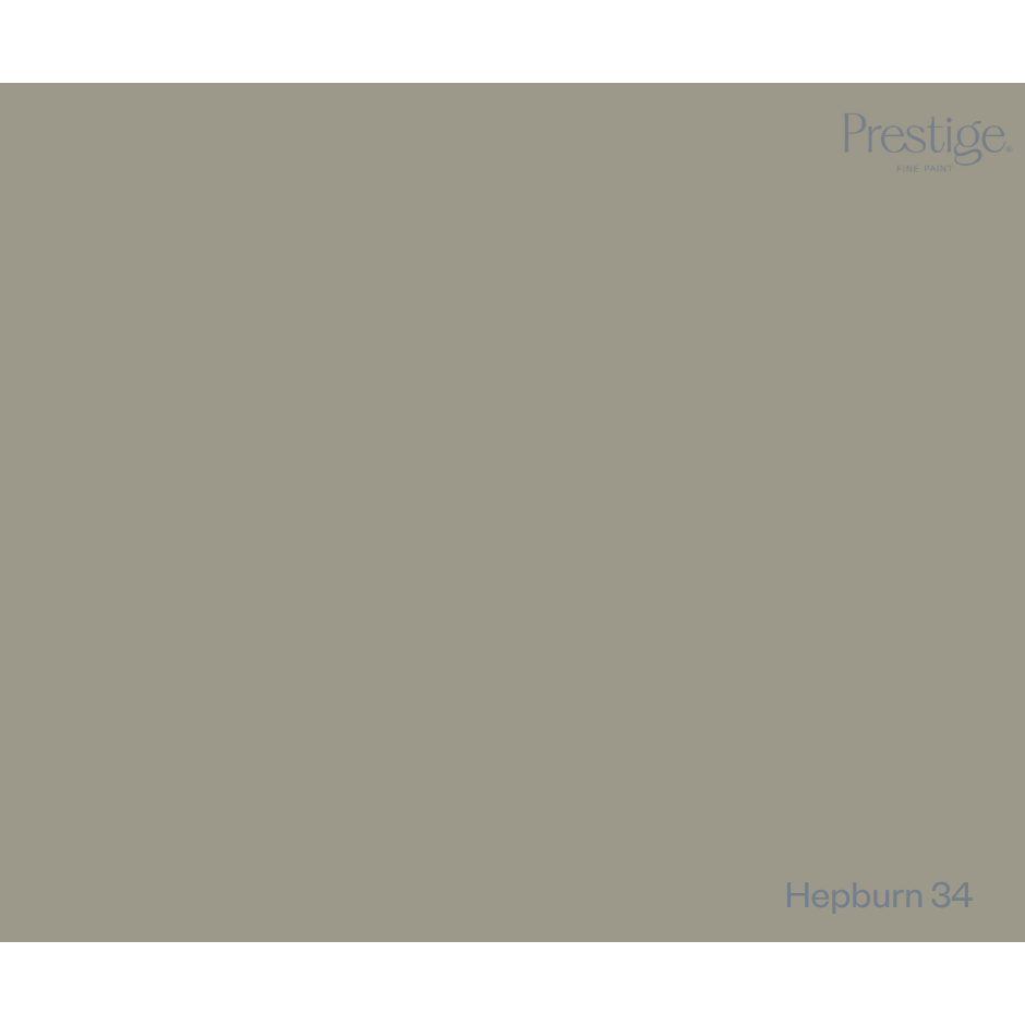 A solid color swatch card for Prestige fabric, labeled 'Hepburn 34' in the bottom right corner, featuring a muted olive-gray color.