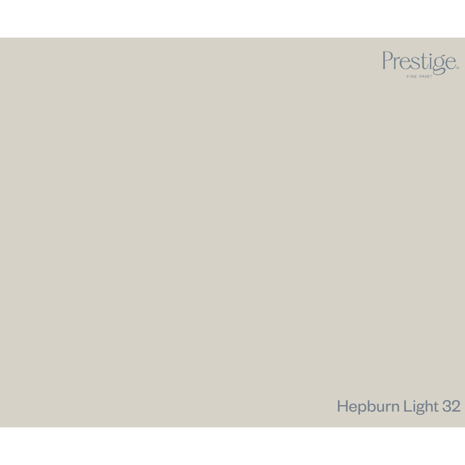 A flat, solid colour swatch card in a warm light greige, labeled 'Prestige. Fine Paint. Prestige Hepburn Light Paint