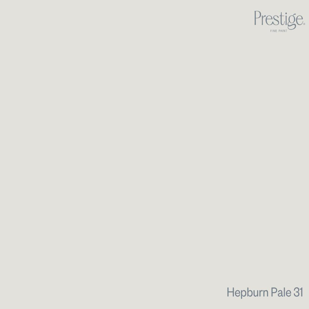 Prestige Hepburn Pale
A minimalist color swatch card featuring a solid light warm gray-beige background, with the Prestige brand logo in the top right and the text 'Hepburn Pale 31' in the bottom right.