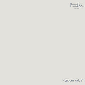 Prestige Hepburn Pale
A minimalist color swatch card featuring a solid light warm gray-beige background, with the Prestige brand logo in the top right and the text 'Hepburn Pale 31' in the bottom right.