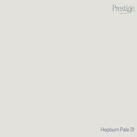 Prestige Hepburn Pale
A minimalist color swatch card featuring a solid light warm gray-beige background, with the Prestige brand logo in the top right and the text 'Hepburn Pale 31' in the bottom right.