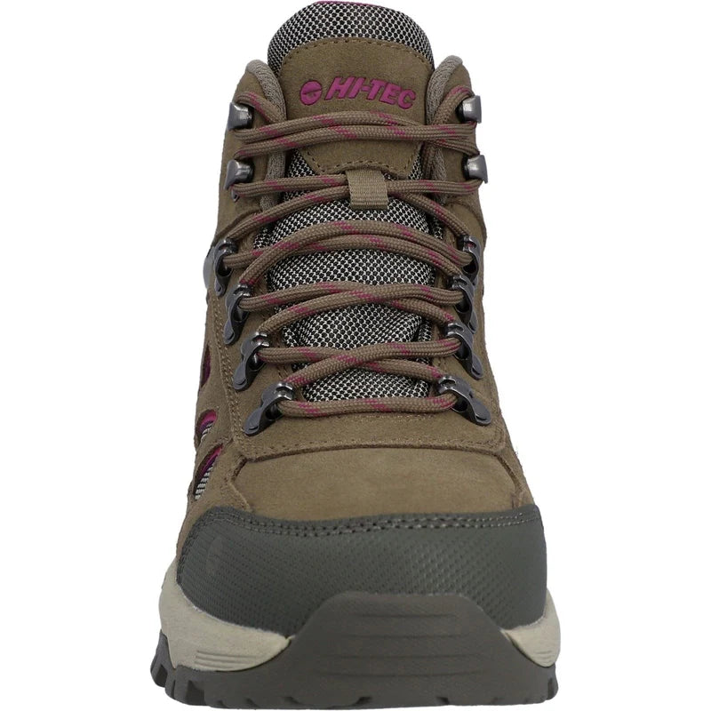 A Hitec mid-top hiking boot in olive brown with dark gray mesh panels, brown laces, and pink brand lettering on the tongue, shown against a plain white background.
Hi-Tec Bandera Expedition Leather Women's Hiking Boots | Olive