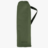 Green compression bag with a handle on a white background