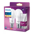A retail box of two Philips LED light bulbs in warm white, shown on a plain white background. The packaging is predominantly purple with white, blue, and yellow label elements.