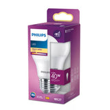 A Philips LED light bulb in its original purple and white retail packaging, shown on a clean white background.