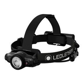 A black LED headlamp with an adjustable headband, featuring the brand name 'LEDLENSER' printed in white on the band, set against a plain white background. Ledlenser Headlamp H9R | 2400 Lumen