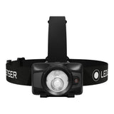 A black LED headlamp with an adjustable black head strap, shown against a solid white background. The brand name 'LEDSER' is printed in white on the strap. Ledlenser Headlamp HF6R | 900 Lumen