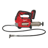 Red Milwaukee power tool with hose on a white background