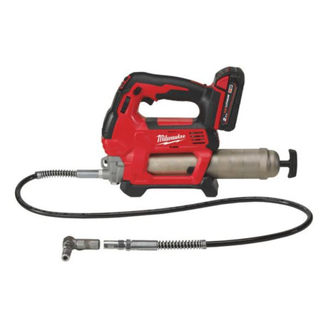 Red Milwaukee power tool with hose on a white background