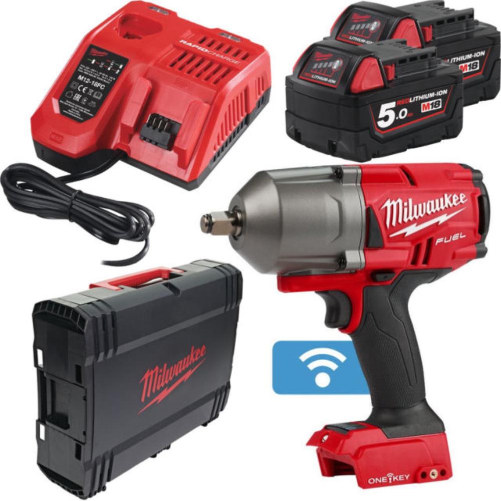 Milwaukee power tool set with impact wrench, batteries, charger, and case on a white background