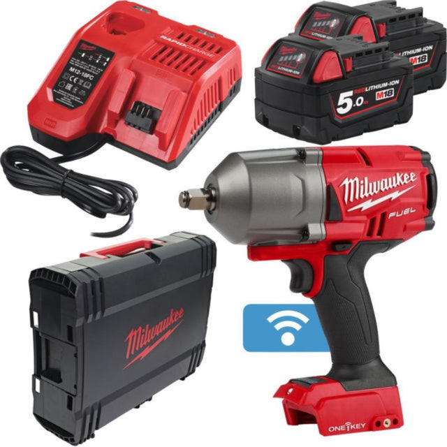 Milwaukee power tool set with impact wrench, batteries, charger, and case on a white background