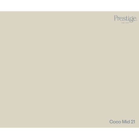 A solid color swatch card for Prestige Fine Paint in the shade Coco Mid 21, showing a warm light beige-gray color with the brand logo in the top right and the shade name in the bottom right.
Prestige Coco Mid