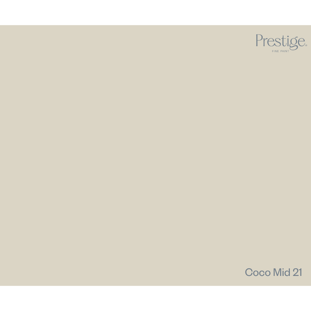 A solid color swatch card for Prestige Fine Paint in the shade Coco Mid 21, showing a warm light beige-gray color with the brand logo in the top right and the shade name in the bottom right.
Prestige Coco Mid