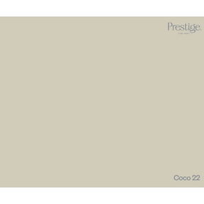 A solid color swatch card for Prestige Fine Furnishings, showing the color Coco 22, a warm light beige with a subtle gray undertone.