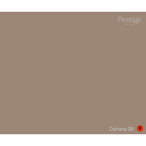 A solid color swatch card for Prestige One Coat in the shade Dahana 29, featuring a warm taupe-brown background with the brand name and shade name in white text.
Prestige Dahana Paint