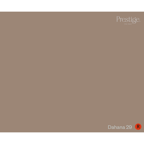 A solid color swatch card for Prestige One Coat in the shade Dahana 29, featuring a warm taupe-brown background with the brand name and shade name in white text.
Prestige Dahana Paint