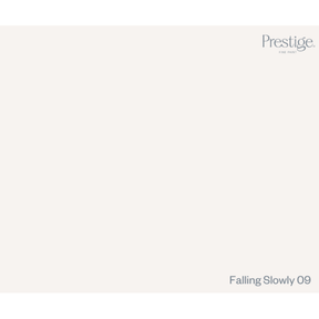 A minimalist color swatch card for Prestige Fine Paints, showing a solid warm off-white color labeled 'Falling Slowly 09' in the bottom right corner, with the Prestige brand logo in the top right.