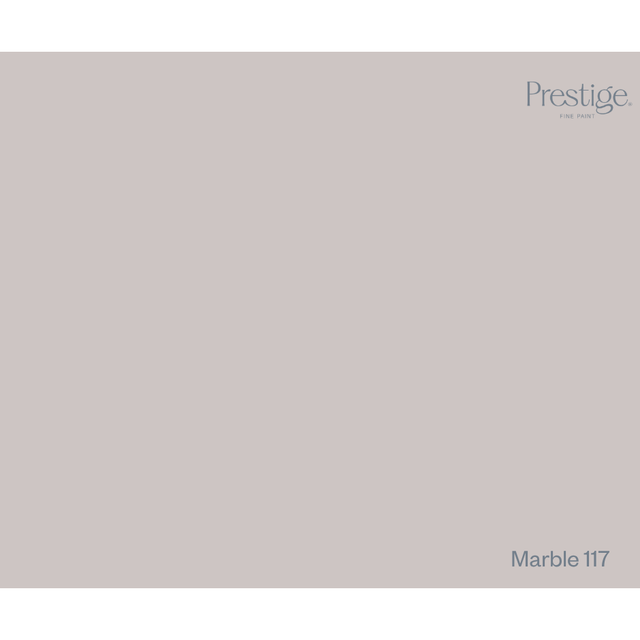 A solid color swatch tile in a light warm gray-beige shade, labeled 'Marble 117' in the bottom right corner with the Prestige logo in the top right.