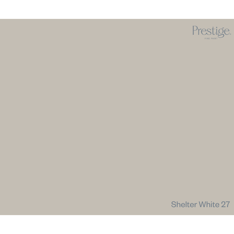 A solid color swatch card for Prestige. Home Paints in the color 'Shelter White 27', featuring a light warm gray-beige background with the brand name and product name printed in a muted blue-gray font.