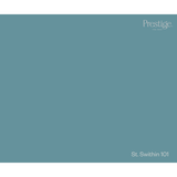 A solid color swatch card for Prestige Fine Paper in the shade 'St. Swithin 101', showing a muted teal-blue color with white text branding in the corners.