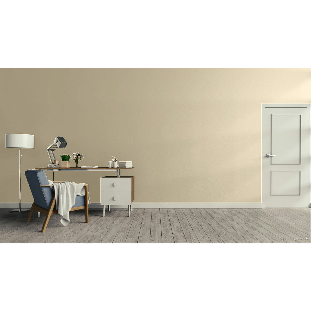 A minimalist interior room scene with a beige wall, grey wood floor, a white door on the right, and a home office setup on the left featuring a desk, lamp, chair, and throw blanket. Prestige Winter Solstice Paint