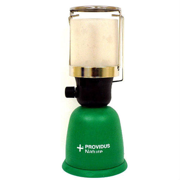 A green and black camping lantern with a clear glass shade and a gold metal trim, branded with 'PROVIDUS Nature' on the green base, set against a plain white background.