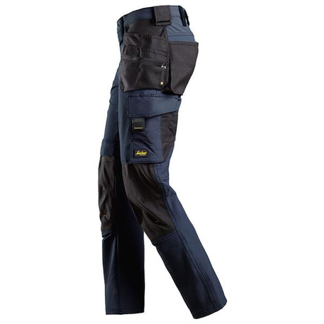 Navy and black work pants with multiple pockets on a white background. Snickers 6271 AllroundWork Full Stretch Trousers Holster Pockets