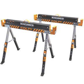 Two COLT Roughneck portable work platforms with black and orange striped tops and silver and black legs, shown on a plain white background. Roughneck Colt Folding Saw Horse Twin Pack