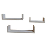 Three light gray wood floating wall shelves of different sizes arranged on a plain white background.