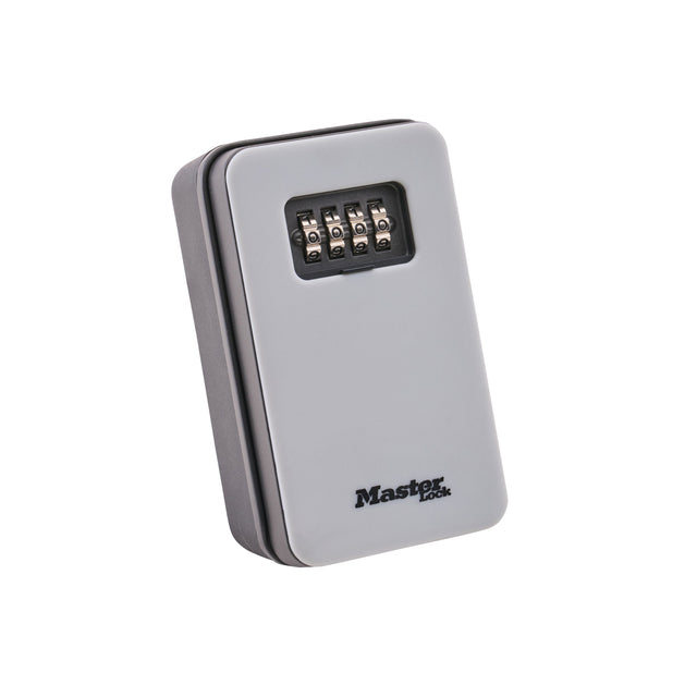 A Master Lock combination key box in a metallic silver finish, featuring a black combination dial on the front and the Master Lock brand logo printed near the bottom.  MasterLock Key Lock Box - New Design